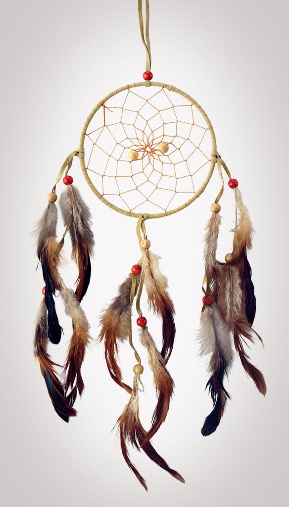 5" diameter ring wrapped in tan leather and with tan leather straps and earth-toned feathers adorned with brick red and beige wooden beads on white background.